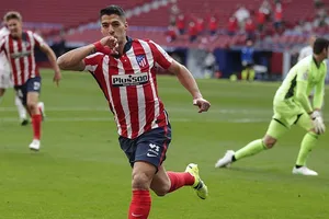 Luis Suarez đã không thể có màn ăn mừng trọn vẹn. Ảnh: Getty Images