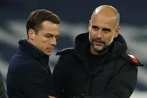 HLV Pep Guardiola tin Scott Parker là một trong những đồng nghiệp trẻ nhiều hứa hẹn nhất. Ảnh: Getty Images