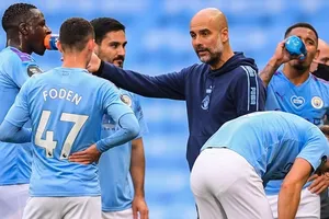 HLV Pep Guardiola chỉ quan tâm xây dựng một tập thể đồng đều tại Man.City. Ảnh: Getty Images 