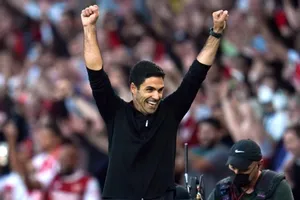 Mikel Arteta tận hưởng chiến thắng trong cột mốc 100 trận. Ảnh: Getty Images
