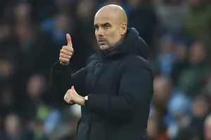 HLV Pep Guardiola khẳng định đang hạnh phúc ở Man.City. Ảnh: Getty Images