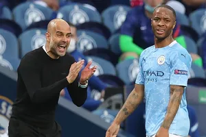 HLV Pep Guardiola và Raheem Sterling khi còn ở Man.City. Ảnh: Getty Images 