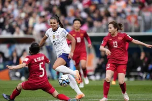 Các cô gái Việt Nam can trường trước đương kim vô địch và là số 1 thế giới tuyển Mỹ.