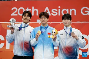 Kim Young-beom khi giành huy chương bạc ở nội dung bơi tự do 100m. Ảnh: THX