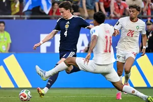 Scott McTominay (trái) chơi rất hay cho đội tuyển Scotland tại World Cup 2026. Ảnh: THX