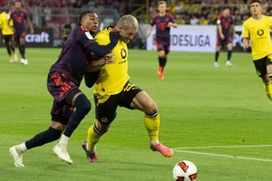 Bayern Munich (trái) đánh bại Borussia Dortmund ở Siêu cúp nước Đức hồi tháng 8. Ảnh: THX