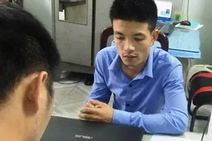 Đối tượng Nguyễn Hữu Tuân tại cơ quan công an 