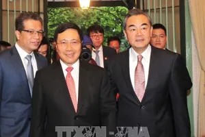 Phó Thủ tướng, Bộ trưởng Ngoại giao Phạm Bình Minh đón Bộ trưởng Ngoại giao Trung Quốc Vương Nghị. Ảnh: TTXVN