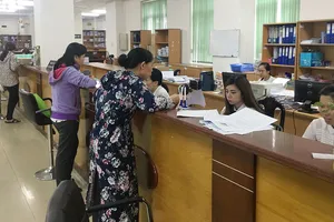 BHXH TPHCM tiếp nhận hồ sơ tham gia BHYT và điều chỉnh sai sót trong hồ sơ  của người tham gia BHYT hàng ngày