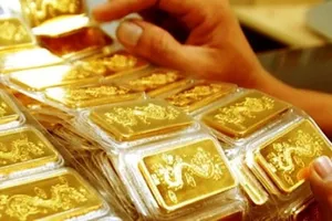 Vàng SJC quay đầu giảm 900.000 đồng/lượng
