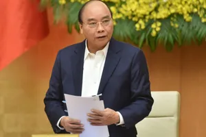 Thủ tướng Nguyễn Xuân Phúc chủ trì phiên họp Chính phủ thường kỳ tháng 12-2020. Ảnh: VGP