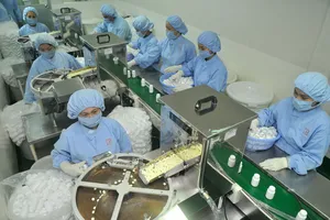 Doanh nghiệp kinh doanh có lãi mới dễ tiếp cận gói vay ưu đãi  (Sản xuất dược phẩm tại Công ty Pharmedic, TPHCM). Ảnh: CAO THĂNG