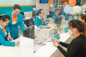 Sự bứt phá của tín dụng dịp cuối năm 2021 đã thúc đẩy lợi nhuận ngân hàng tăng mạnh.  Ảnh: PHAN LÊ 