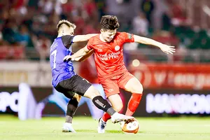 Thể Công - Viettel (phải) là một trong những CLB đổi tên ở mùa giải năm nay. Ảnh: DŨNG PHƯƠNG