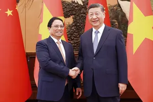 Thủ tướng Phạm Minh Chính hội kiến Tổng Bí thư, Chủ tịch Trung Quốc Tập Cận Bình. Ảnh: TTXVN