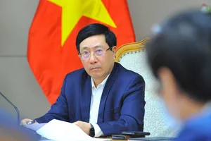 Phó Thủ tướng Thường trực Chính phủ Phạm Bình Minh  chủ trì cuộc họp. Ảnh: TTXVN