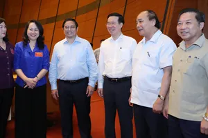 Chủ tịch nước Nguyễn Xuân Phúc, Thủ tướng Phạm Minh Chính,  Thường trực Ban Bí thư Võ Văn Thưởng và các đại biểu dự hội nghị.  Ảnh: QUANG PHÚC