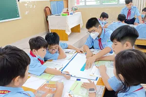 Học sinh Trường THCS Bàn Cờ (quận 3, TPHCM) trong tiết học môn Lịch sử - Địa lý. Ảnh: THU TÂM