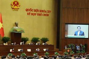 Thủ tướng Phạm Minh Chính trình bày báo cáo đánh giá bổ sung kết quả thực hiện kế hoạch phát triển kinh tế - xã hội và ngân sách nhà nước năm 2024. Ảnh: QUANG PHÚC