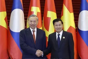 Tổng Bí thư Tô Lâm và Tổng Bí thư, Chủ tịch nước Lào Thongloun Sisoulith đồng chủ trì Cuộc gặp cấp cao giữa Đảng Cộng sản Việt Nam và Đảng Nhân dân Cách mạng Lào. Ảnh: TTXVN