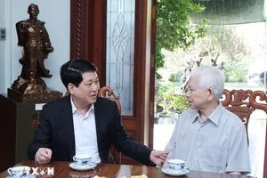 Chủ tịch nước Lương Cường thăm, chúc Tết nguyên Chủ tịch nước Nguyễn Minh Triết. Ảnh: TTXVN