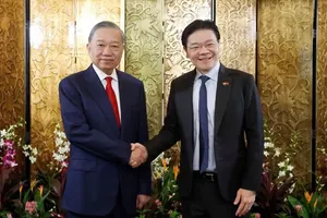 Tổng Bí thư, Chủ tịch nước Tô Lâm và Thủ tướng Singapore Lawrence Wong. Ảnh: TTXVN 