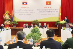 Trao đổi kinh nghiệm về công tác tôn giáo Việt Nam - Lào