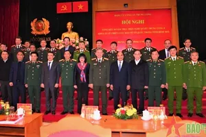 Chủ tịch nước Nguyễn Xuân Phúc với các đại biểu dự Hội nghị. Ảnh: QĐND