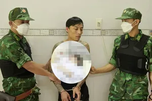 Đối tượng Nguyễn Hồ Ngọc Vinh bị lực lượng chức năng bắt giữ. Ảnh: BĐBP