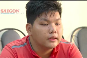 Nguyễn Khoa Minh tại cơ quan công an 