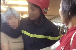 Cảnh sát giải cứu người phụ nữ mắc kẹt trong thang máy ở quận 5, TPHCM