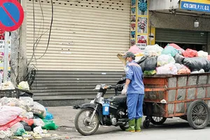 Băn khoăn cân rác tính tiền
