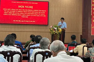 Hội nghị tổng kết công tác đấu tranh phòng, chống tội phạm tệ nạn xã hội và phong trào toàn dân bảo vệ an ninh tổ quốc tại phường Tân Thới Hiệp, TPHCM. Ảnh: THANH HIỀN