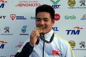 Chu Duc Anh brings home 3rd gold medal at the men's recurve (one stringed bow) 