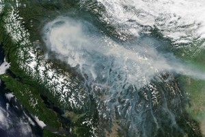 Blazes merge into largest ever wildfire in westernmost Canada
