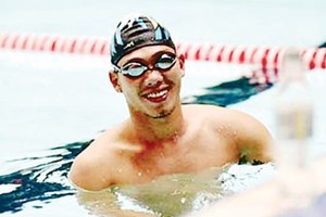 Swimmer Vo Thanh Tung wins gold medal  in the men’s 100m breaststroke category- Photo: SGGP