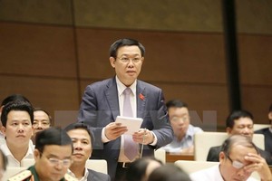 Deputy Prime Minister Vuong Dinh Hue speaks at the hearing session of the 14th National Assembly’s fourth sitting (Source: VNA)