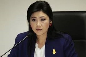 Thai police seek to bring former PM Yingluck home