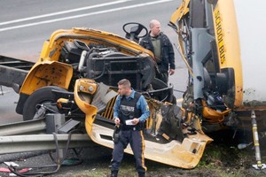 US school bus crash: one student, one teacher killed