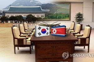 Koreas to hold flurry of talks over sports, family reunions, railway connections