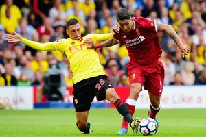 Liverpool (phải) sẽ có chuyến làm khách không hề dễ dàng trước Hoffenhieim