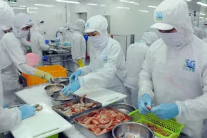 Chế biến thực phẩm tại SG Food. Doanh nghiệp nhóm sản phẩm công nghiệp chủ lực thực phẩm chế biến. Ảnh: CAO THĂNG