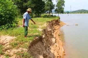 Hạn chế việc lấn, thu hẹp không gian chứa, thoát lũ của sông