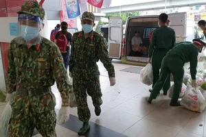 Việc tăng cường nhân lực giúp các siêu thị soạn và nhận nhiều đơn hàng hơn. Ảnh: Siêu thị Sài Gòn