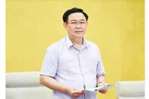 Chủ tịch Quốc hội Vương Đình Huệ phát biểu tại hội thảo. Ảnh: VIẾT CHUNG