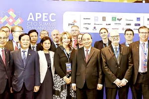  Chủ tịch nước Nguyễn Xuân Phúc dự Tọa đàm cấp cao  Liên minh Doanh nghiệp Hoa Kỳ - APEC. Ảnh: TTXVN