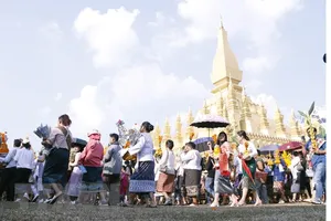 Chính phủ Lào đã quyết định tăng lương cơ bản lần thứ hai trong vòng 4 tháng. Ảnh: TTXVN