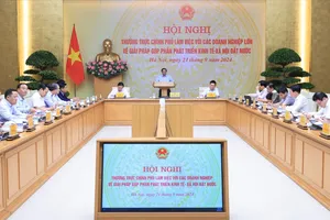 Thủ tướng Phạm Minh Chính chủ trì hội nghị của Thường trực Chính phủ làm việc với các doanh nghiệp. Ảnh: VIẾT CHUNG