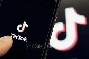 Biểu tượng ứng dụng TikTok trên màn hình điện thoại di động. Ảnh: Kyodo/TTXVN