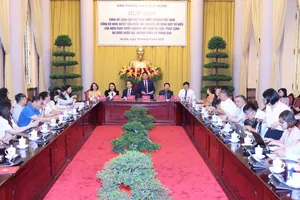 Họp báo về Lệnh của Chủ tịch nước về việc công bố Nghị quyết sửa đổi, bổ sung một số điều của Hiến pháp và công bố Luật Tổ chức chính quyền địa phương. Ảnh: QUANG PHÚC